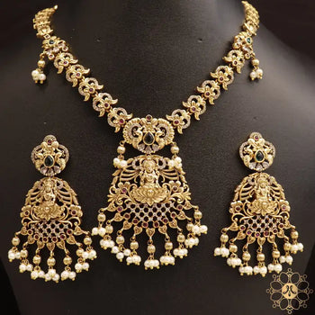 Antique Gold Flaral Lakshmi Necklace With White Stone